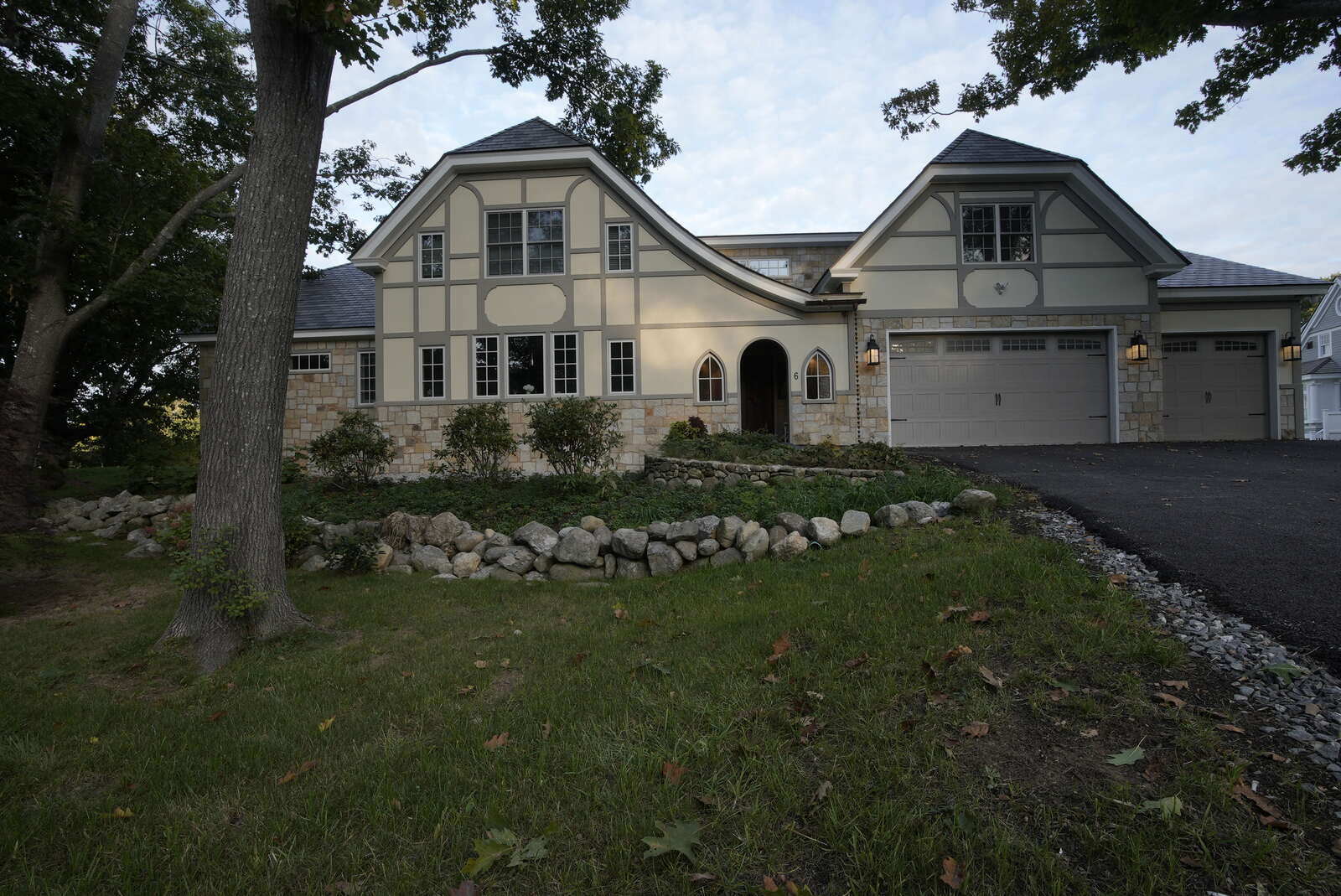 Exterior view of a remodeled home in New Hampshire by Oxland Builders, showcasing elegant architectural design Exterior view of a remodeled home in New Hampshire by Oxland Builders, showcasing elegant architectural design