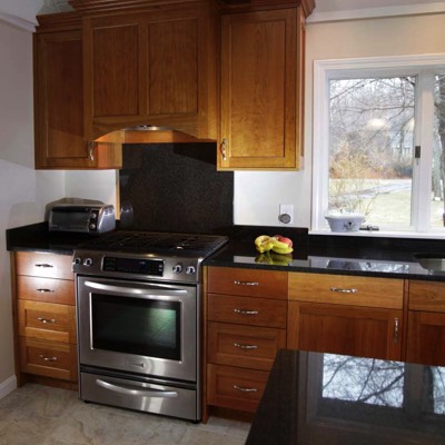 Custom wood shaker cabinets with chrome pulls