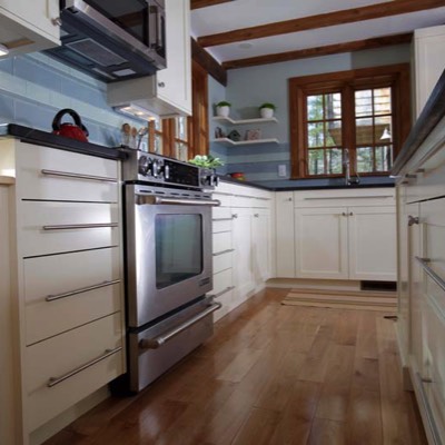 Low-angle kitchen stove cabinet