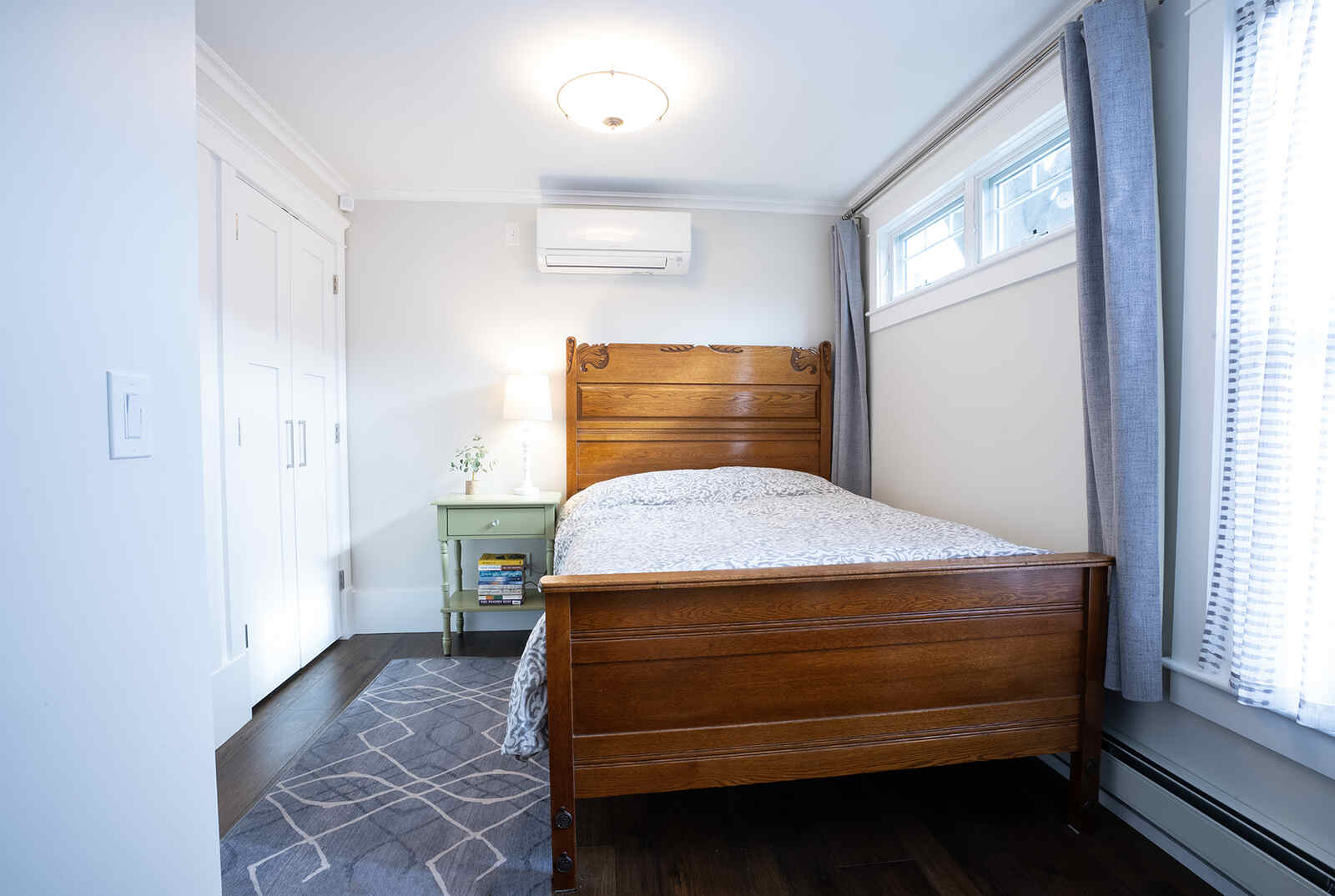 bedroom with bed in whole home remodel new hampshire bedroom with bed in whole home remodel new hampshire