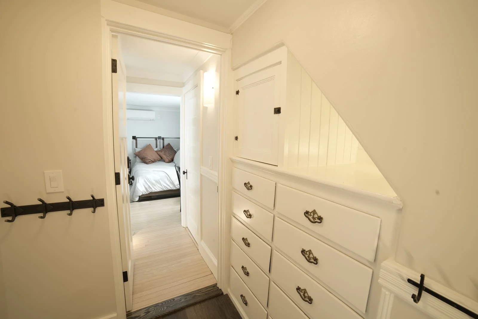 built in cabinets in hallway wall leading to bedroom in whole home remodel in new hampshire built in cabinets in hallway wall leading to bedroom in whole home remodel in new hampshire
