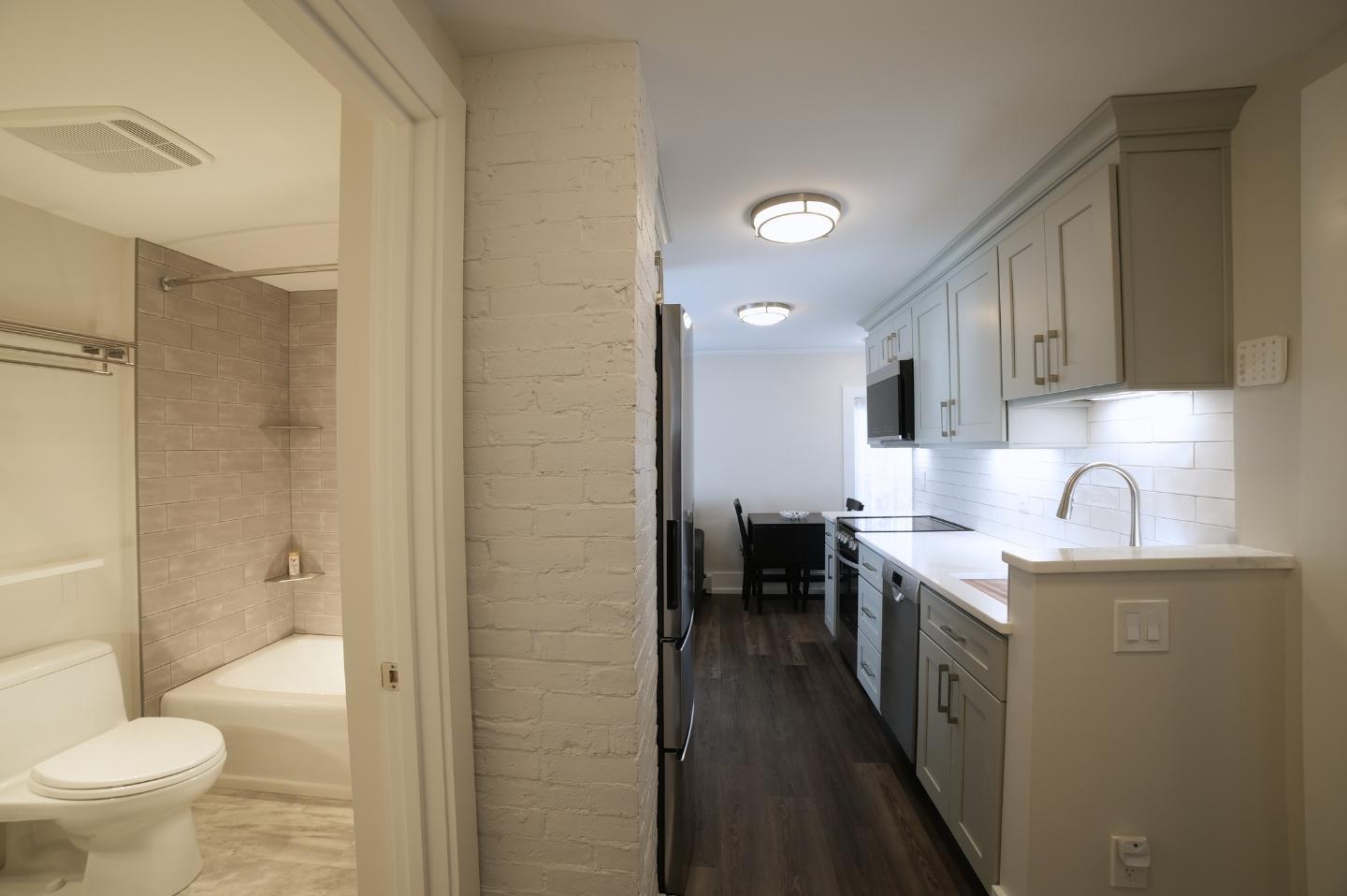 kitchen hallway with bathroom side view white subway tile backsplash kitchen hallway with bathroom side view white subway tile backsplash