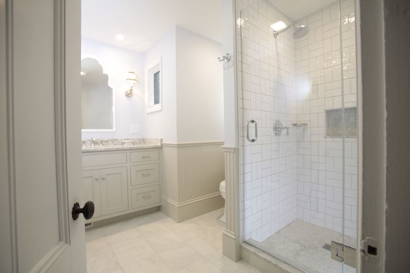 Bathroom remodel with walk-in shower and custom built vanity